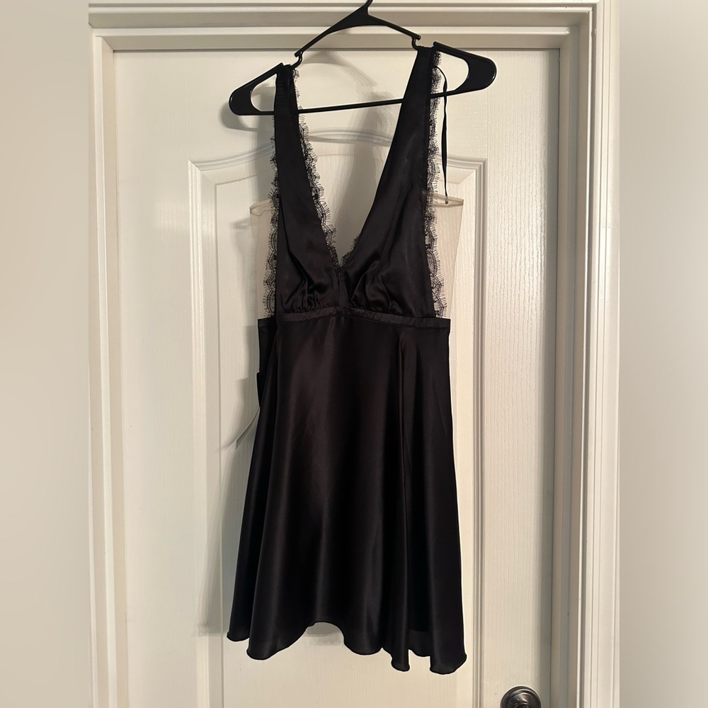 Brand new Bebe dress. Never worn with tags still on